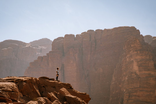 Woman on top of a rock in Wadi Rum