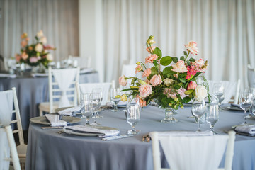 Luxury wedding table decoration. Special event table set up. Fresh flower decoration. Pastel colors - blue and pink decoration