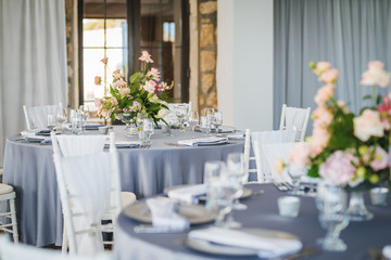 Luxury wedding table decoration. Special event table set up. Fresh flower decoration. Pastel colors - blue and pink decoration
