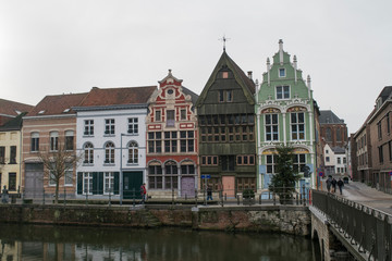 Fototapeta na wymiar Old fashioned houses of Haverwerf on the Dijle River in Mechelen, Belgium