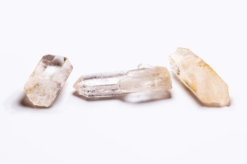 Rose quartz isolated on white background. Energizing stone, meditation. Spirituality concept, Brazilian ore.