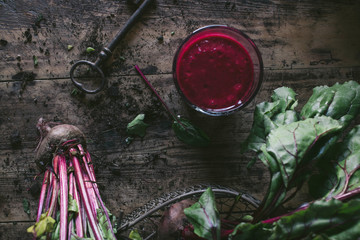 Beetroot and fresh smoothie on wooden table