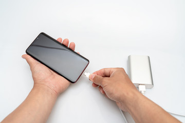  The person who is charging the phone