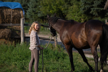 Young girl with her horse , pretty girl with her horse
