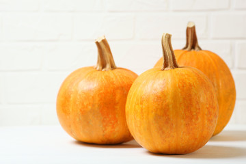pumpkins on a colored background. Thanksgiving background. Autumn background.