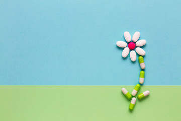 Pills in the shape of flowers