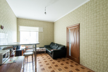 Russia, Moscow- June 05, 2019: interior room apartment. standard repair decoration in hostel. kitchen and dining room