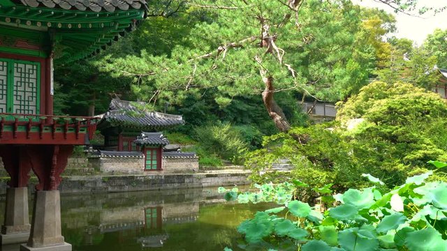 Huwon secret garden view at Changdeokgung Palace with view of Buyongji pond and Buyongjeong pavilion in Seoul South Korea