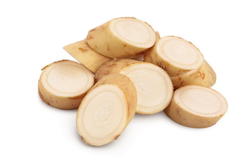 Horseradish root with slices isolated on white background