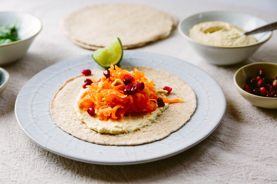 Carrot and hummus wraps.