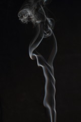 Fototapeta na wymiar Abstract white smoke texture on black background