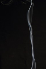 Abstract white smoke texture on black background