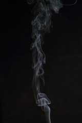 Obraz premium Abstract white smoke texture on black background