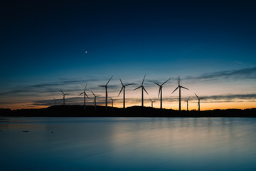 Wind turbines motion landscape sunset