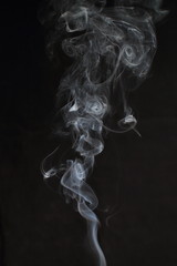 Abstract white smoke texture on black background