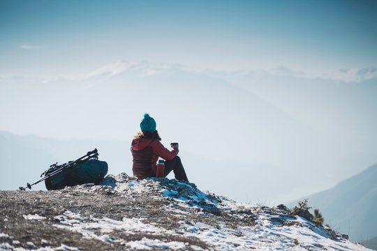 woman looking at mountain peak