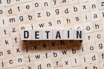 Detain word concept on cubes