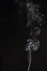 Abstract white smoke texture on black background