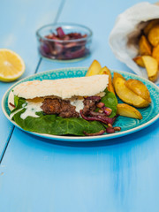 beef burgers with potato wedges