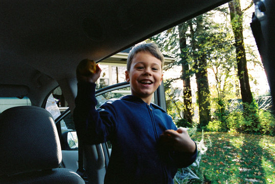 Smiling boy in car