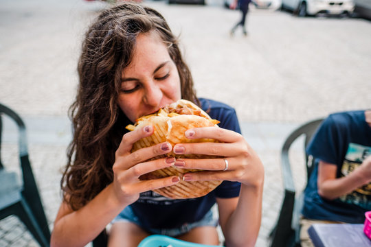 Teen Girl Eating Junk Food In France