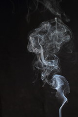 Abstract white smoke texture on black background