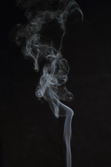 Abstract white smoke texture on black background