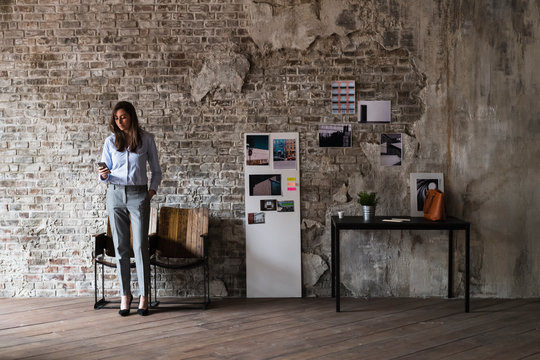 Businesswoman in a modern creative studio