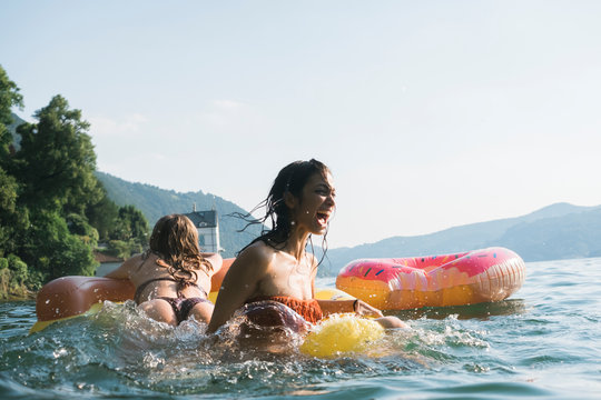 Two friends having fun at the lake