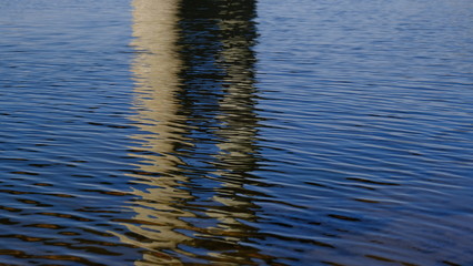  Water surface. Reflection in water. Background for design. River