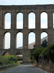 Fototapeta na wymiar Ancient aqueduct called Carolino near Caserta City in South Ital