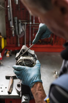 Mechanic at work in a repair car shop