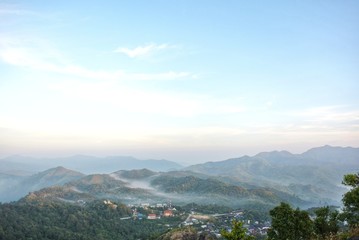 The fog that covers the I-Tong village and the mountain view at the National Elephant War Hill, Thong Pha Phum, Kanchanaburi, Thailand