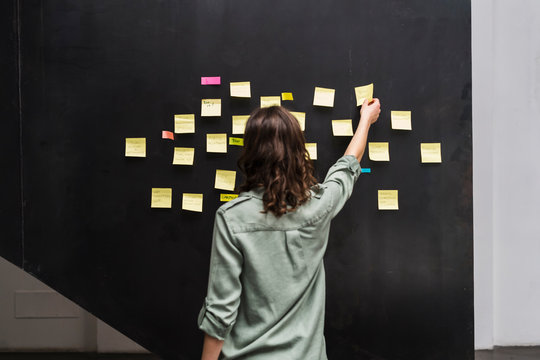 Young businesswoman brainstroming