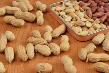 Peanuts on a wooden board