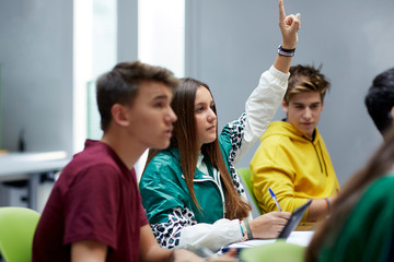 Teenage students participating in the class