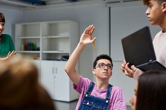 Teenage students participating in the class activity