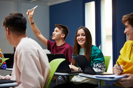 Teenage students participating in the class