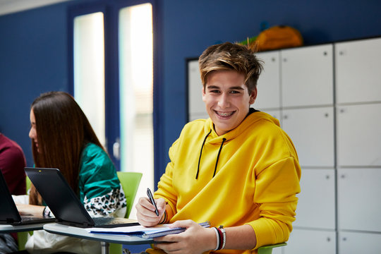 Teenage student sitting in the classroom