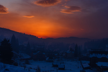 Snow house in winter dreamland at dawn in forest old weather and a lot of snow on roof
