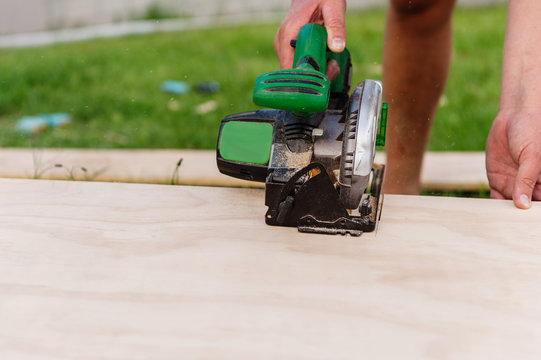 handyman using powertool