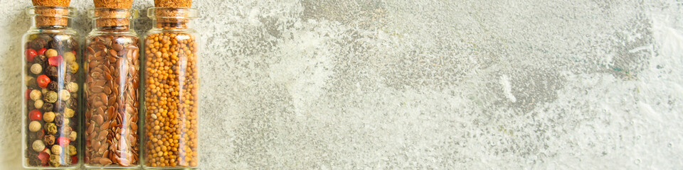 spices, many different types, textures (peas, red pepper, black pepper, turmeric, mountain salt, chia seeds, mustard and much more) menu concept. food background. copy space. Top view