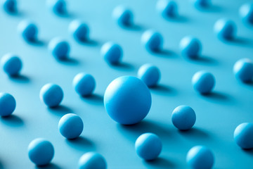 Big ball among small ones