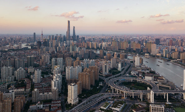 Sunset aerial panorama of the Bund and Lujiazui city landmarks, Shanghai, China