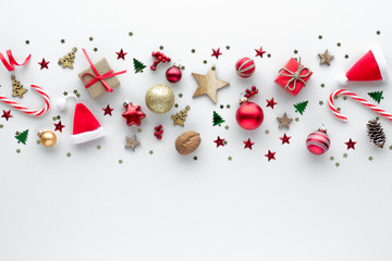 Christmas composition. Santa hat candy cane gift star top view background with copy space for your...