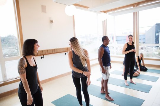 People chatting after - or before - yoga class