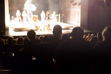 Obraz na płótnie Canvas theater audience watching a show