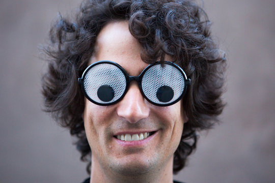 Man Wearing Big Googly Eye Glasses