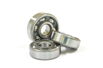 Ball bearing on a white background, Motorcycle bearing close-up.