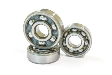 Ball bearing on a white background, Motorcycle bearing close-up.